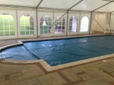 Frame marquee over pool